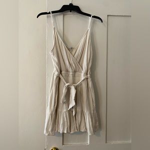 Cream colored romper sized large from American eagle brand lightly worn